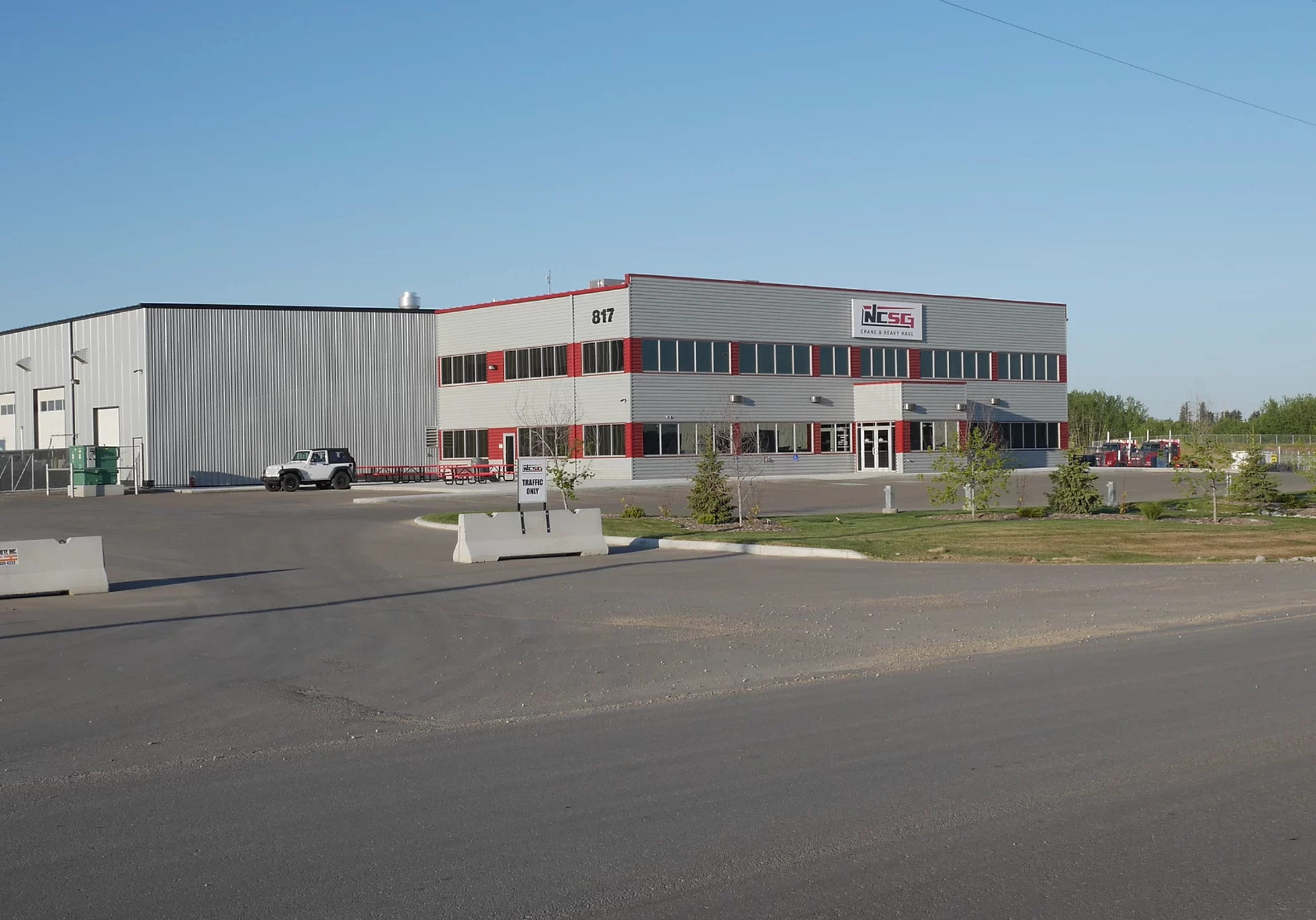 the building exterior and parking lot of NCSG.